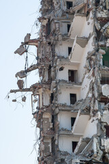 complete demolition destruction of a tall building completely ruined tall building
