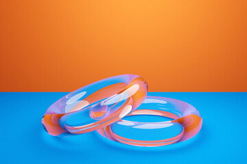 Fototapeta premium 3D illustration of transparent wedding rings on a blue background. Geometric shapes in the form of a ring in the symbol of infinity. Symbol of love and fidelity, union of lovers