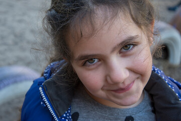 Beautiful girl in the street close up.