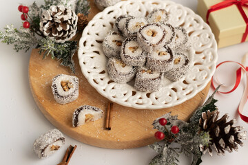 Christmas festive sweets with seasons decorations on white background