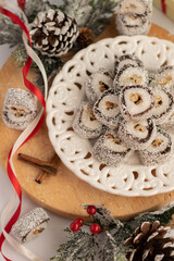 Christmas festive sweets with seasons decorations on white background
