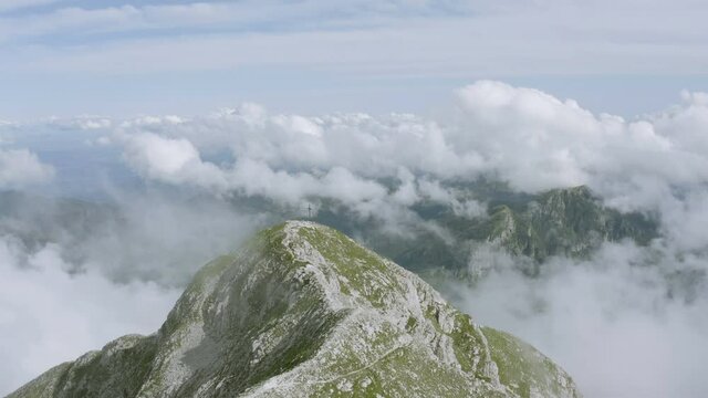 Flying over Pania della Croce mountain top in Apuan Alps, Tuscany, Italy