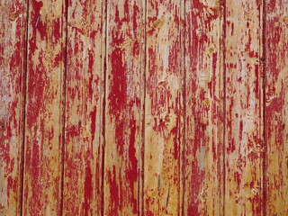 A scratched painted wall of a wooden house on the Lofoten islands.