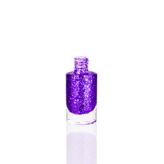 Purple glittering nail polish in glass bottle on white background isolated closeup, opened violet sequin varnish, bright shiny blue lacquer, sparkling enamel, beautiful shimmer gel, cosmetic accessory