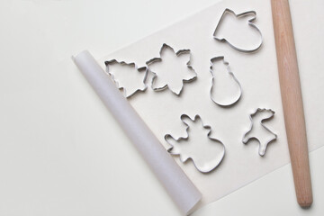group of cookie cutters on bakery paper with copy space