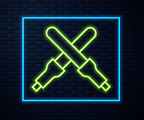Glowing neon line Marshalling wands for the aircraft icon isolated on brick wall background. Marshaller communicated with pilot before and after flight. Vector.