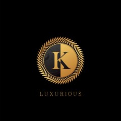Golden K letter Logo Luxurious Nature Leaves, elegance vector design concept circle floral leaves with negative space letter logo.
