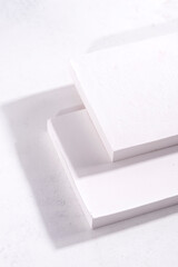 minimal abstract geometric podium scene with white concrete wall