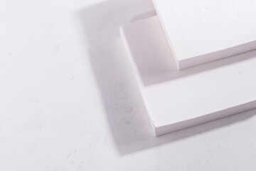 minimal abstract geometric podium scene with white concrete wall