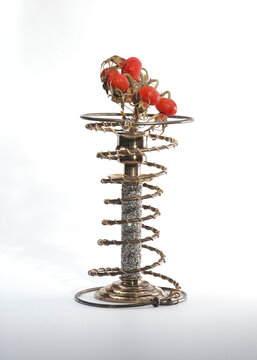  Candle Stick With Red Berries On Branch Like Tongue Of Flame