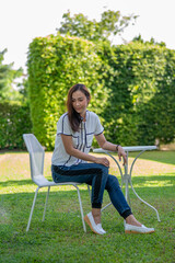 Fototapeta premium Comfortable shoes, Asian Female, Move ahead with your heartful confident. Portrait of a young woman walking on a happy day.