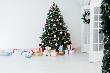 Christmas interior white Christmas room Christmas tree with gifts new year decor December