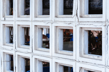 Fototapeta na wymiar An old building with broken windows.