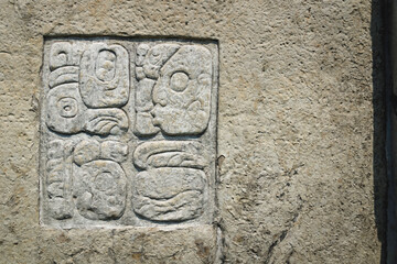 Basrelief carving of Mayan signs at the archaeological site of Palenque, Chiapas, Mexico