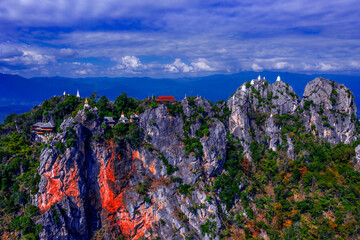 Pagoda on top of the cliff high mountain at Chae-Hom District, Lampang province,Thailand.