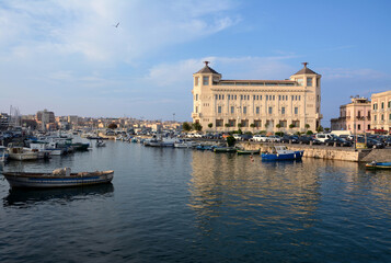The dock of Syracuse is a port and market area that connects the city with the Ortigia peninsula.