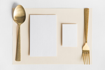 plate with fork and spoon. white blank