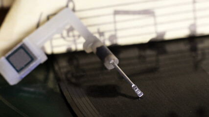 Needle for old-fashioned record player and vinyl, macro