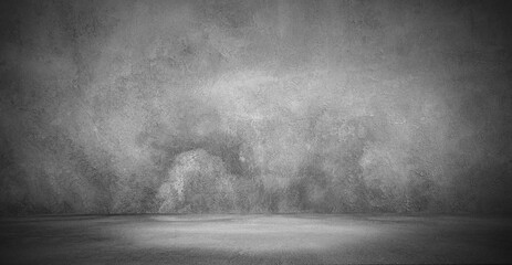 empty room with a concrete wall, gray background. Room for studio.