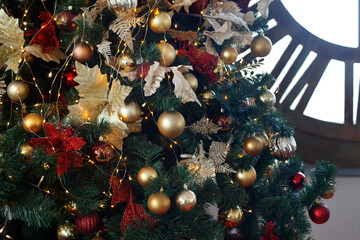 Christmas, New Year fur-tree with gold and brown decoration, selective focus