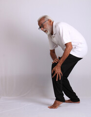 Indian asian old man having  pain or ache sad expressions