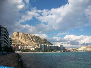 view of the city, the sea and mountains