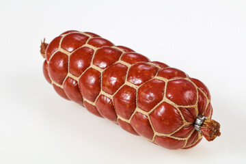 Tasty meat sausages over white background