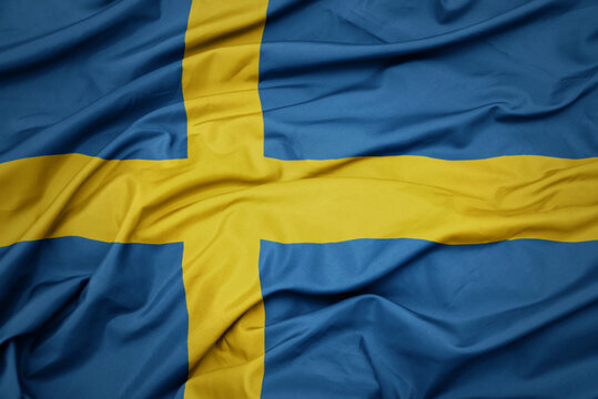 waving colorful national flag of sweden.