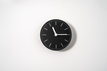 close up of an office clock on white background with clipping path