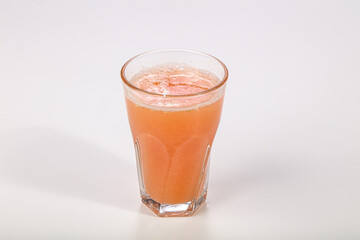 Grapefruit fresh juice in the glass