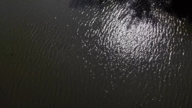  Glare on the water captured from a drone. High quality 4k footage
