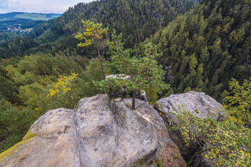 Fototapeta na wymiar Teplice Rocks, part of Adrspach-Teplice landscape park in Czech Republic, view from high rock with Strmen Castle ruins
