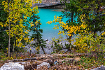 Base of Widow Maker Rapids through the fall colours. Bow Valley Wilderness Area, Alberta, Canada