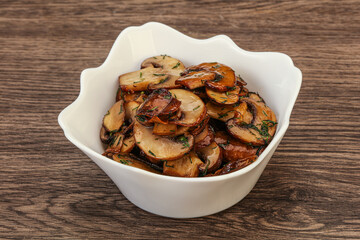 Roasted champignon with herbs and spices