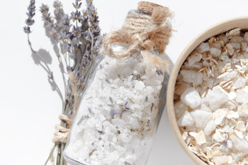 Scrub the skin. Spa products for cleansing the skin and for a relaxing bath in a glass jar with a...