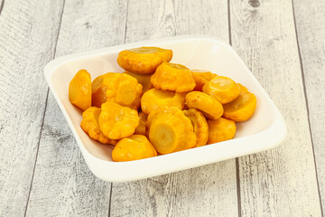 Marinated yellow patisson in the bowl