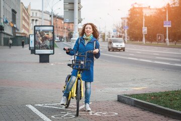 Girl student in a blue jacket outdoor