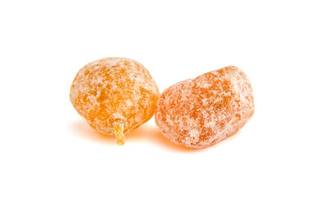 Sugar coated kumquats isolated on white background