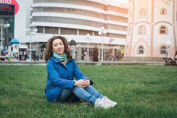 Girl student in a blue jacket outdoor