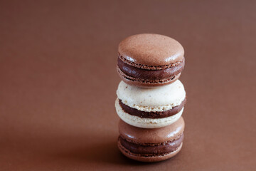Sweet backround with chocolate macarons