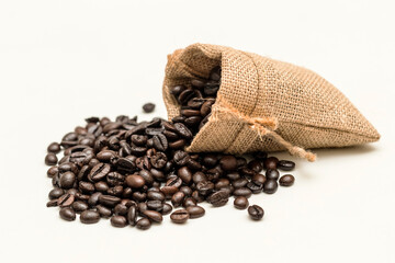 coffee beans in sacks bag isolated white background.
