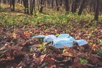 Waste Coronavirus, Covid 19 Pandemic Garbage Face Masks in Nature, Environmental Pollution, Land Waste COVID-19 Waste