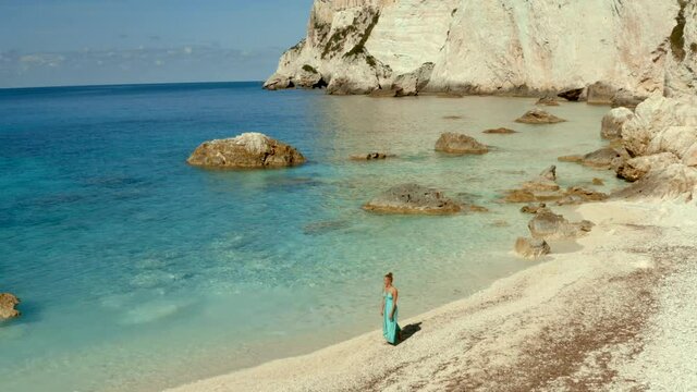 Woman Walking on Tropical Secluded Erimitis Bay Beach in Paxos, Greece