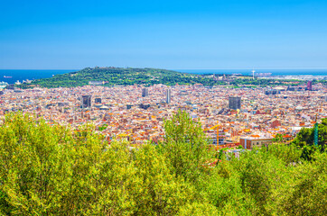 Aerial panoramic view of Barcelona city historical quarters districts with Montju c hill,...