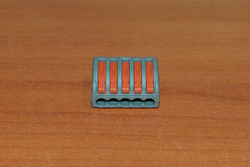 Electrical connector block type of push lever for connect and extend cables, used inside junction box.