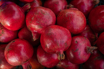 red ripe pomegranate in a box