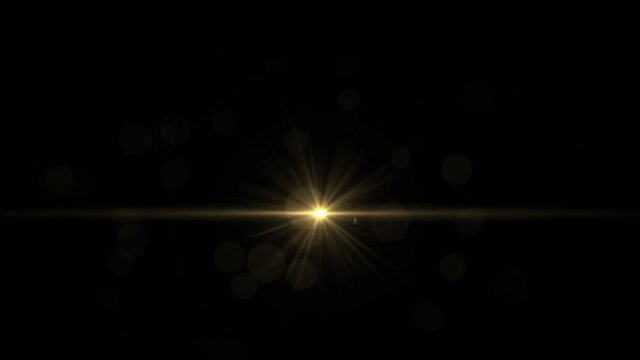 Bright twinkling gold star on a black background