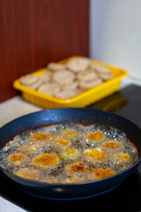Deep fried food ( vegetable) under preparation.