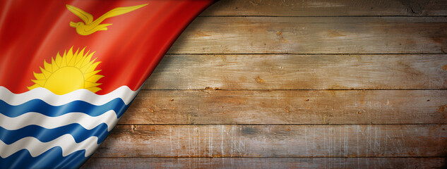 Kiribati flag on vintage wood wall banner