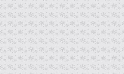 geometric pattern of white snowflakes of different size.
